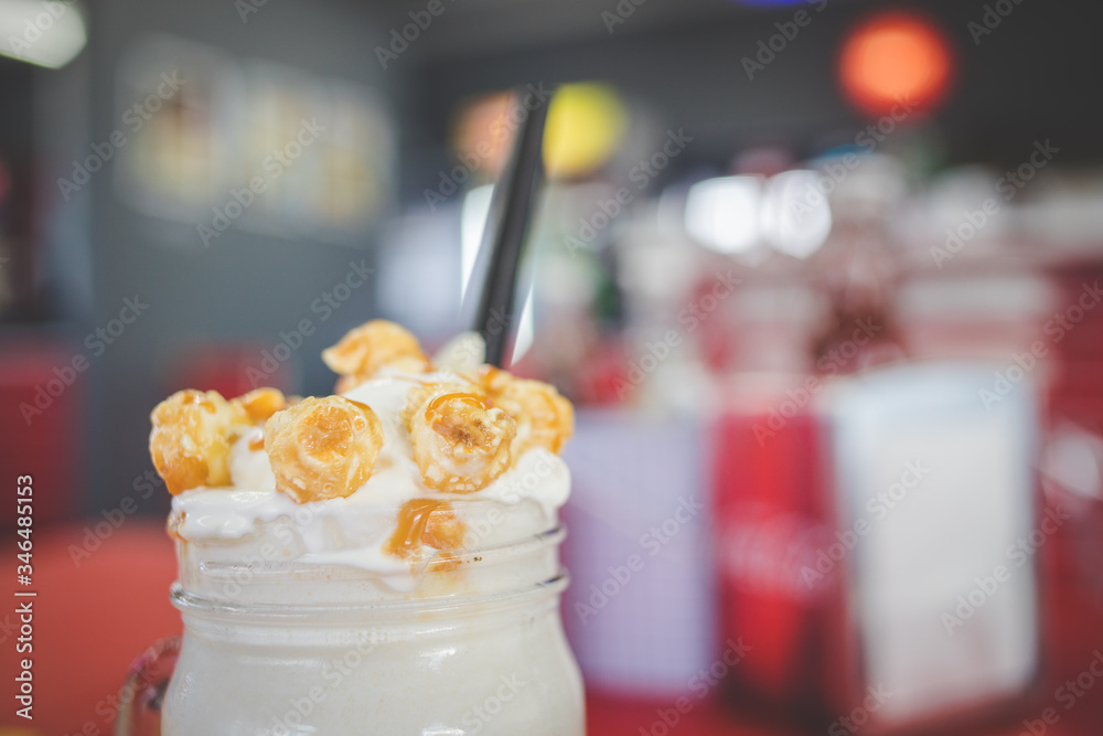 Close up image of gourmet milkshake in a restaurant.