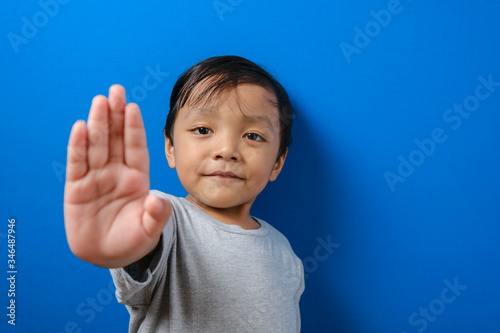 Child stop gesture with hand