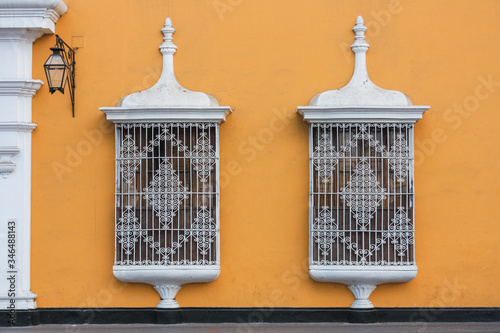 colonial windows in the city of Trujillo, Peru photo