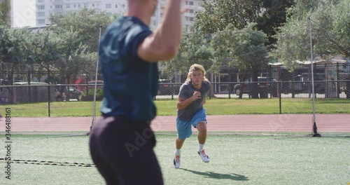 American football players doing speed training