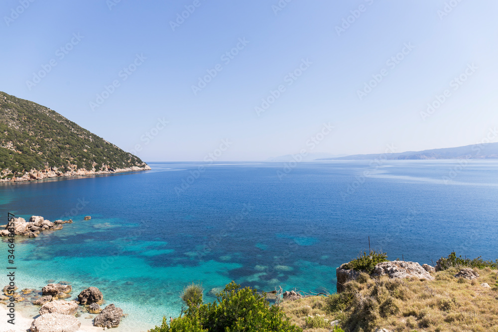 Beach on the island of Kefalonia, Greece. Most beautiful wild rocky beaches with clear turquoise water and high white cliffs Beach on the island of Kefalonia, Greece. Most beautiful wild rocky beaches with clear turquoise water and high white cliffs