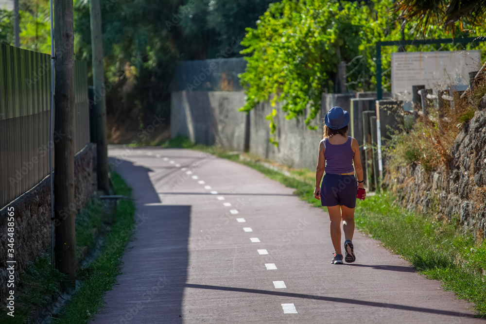 View of eco pedestrian / cycle path, with woman walking