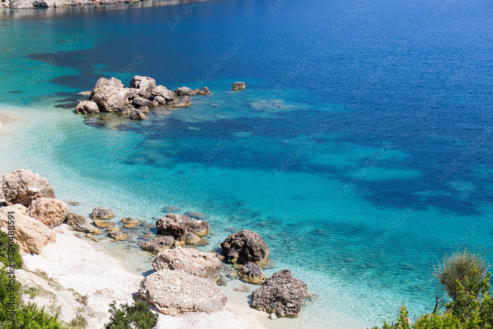 Beach on the island of Kefalonia, Greece. Most beautiful wild rocky beaches with clear turquoise water and high white cliffs