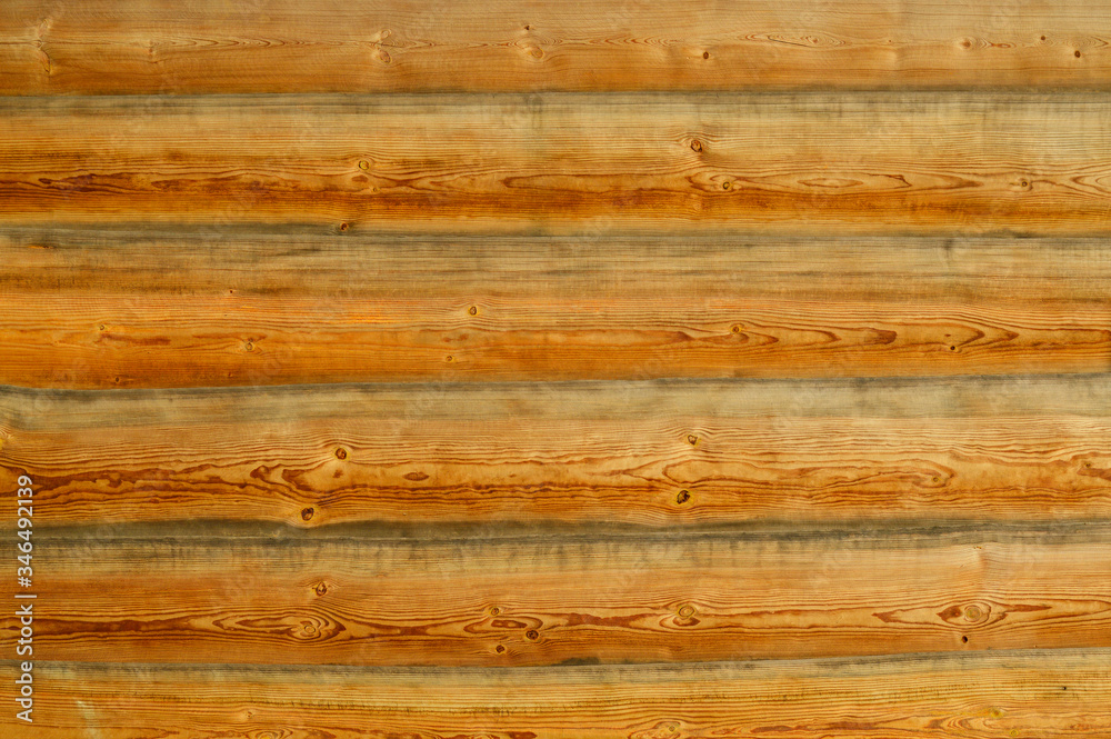 background of brown wooden boards folded one next to another background of brown wooden boards folded one next to another