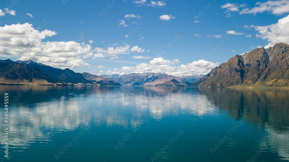 Reflection of lake Hawea in South island, New Zealand