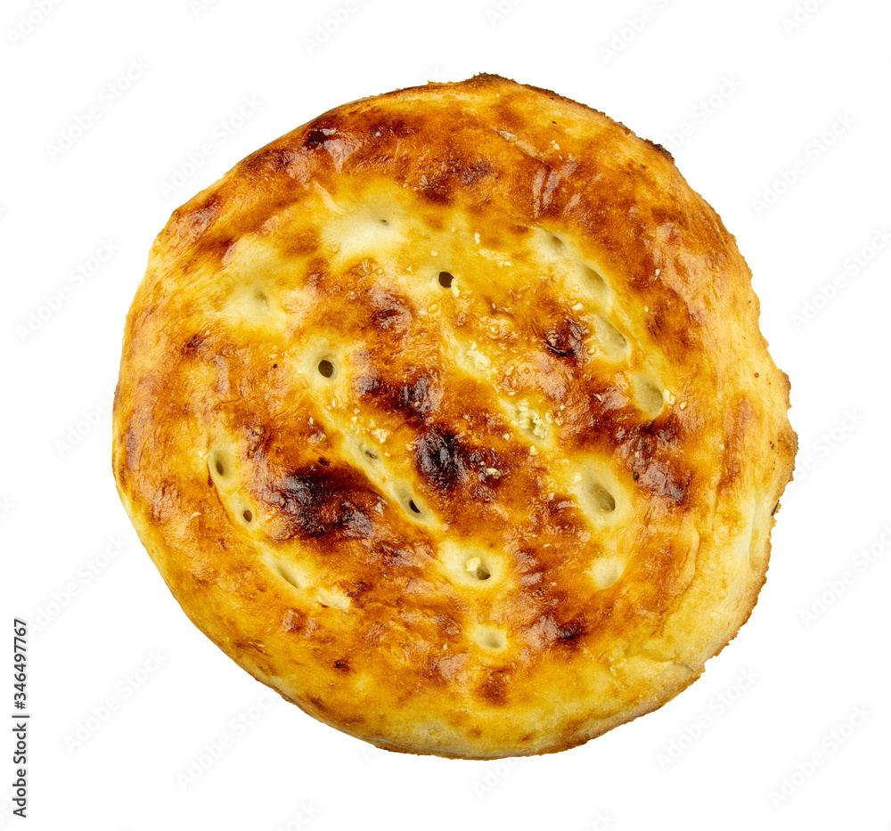 Freshly baked Uzbek pita bread with garlic isolated on a white background. Freshly baked Uzbek pita bread with garlic isolated on a white background.