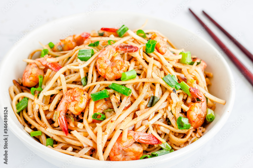 Stir Fried Udon Noodles with Shrimp in a Bowl on White Background. Popular Japanese Food, Asian Food Close Up Photography
