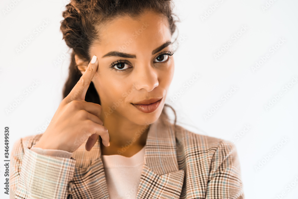 Portrait of beautiful african american woman looking at camera and thinking. Portrait of beautiful african american woman looking at camera and thinking.