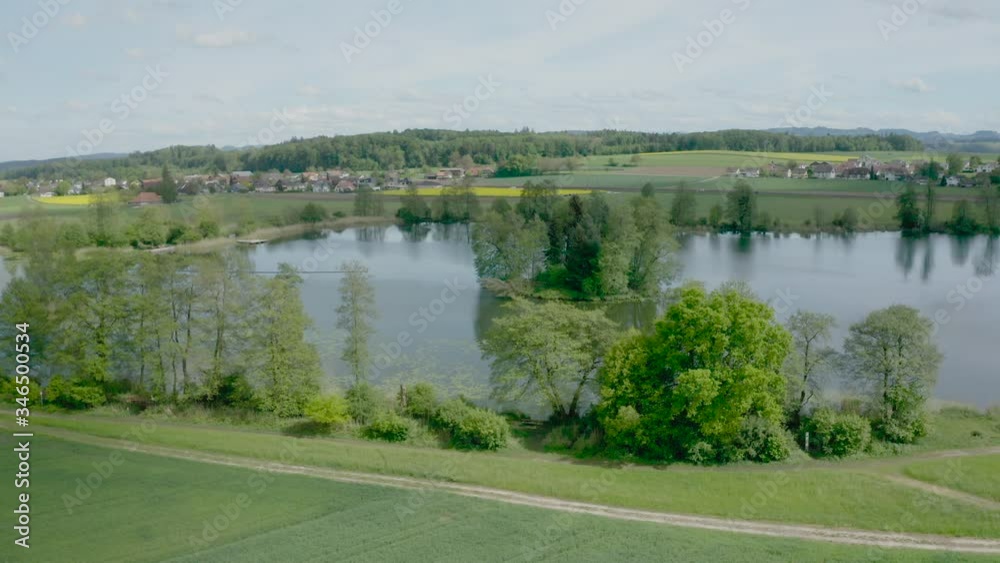Aerial panoramic shot of beautifully located unknown lake in Switzerland Aerial panoramic shot of beautifully located unknown lake in Switzerland