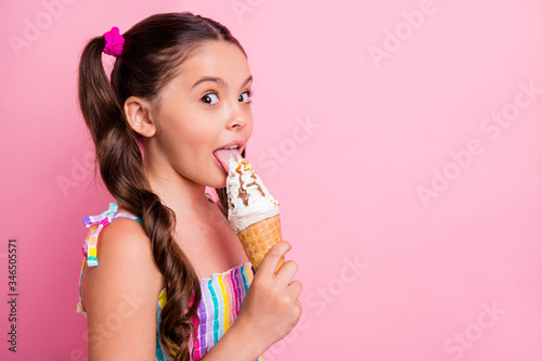 Fotografía Closeup profile photo of beautiful little lady two cute long tails hold big cone