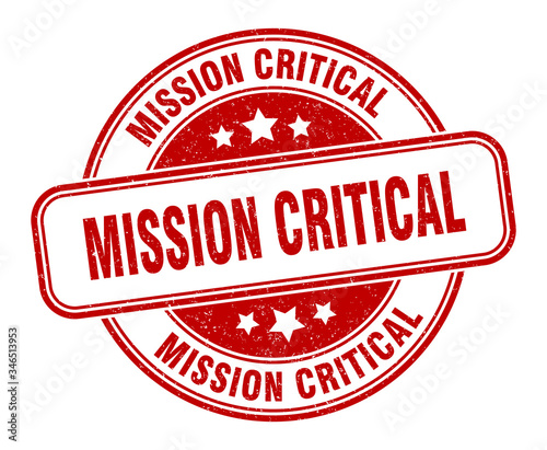 mission critical stamp. mission critical round grunge sign. label