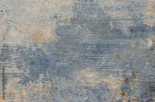Old cement floor with blurred patterned background