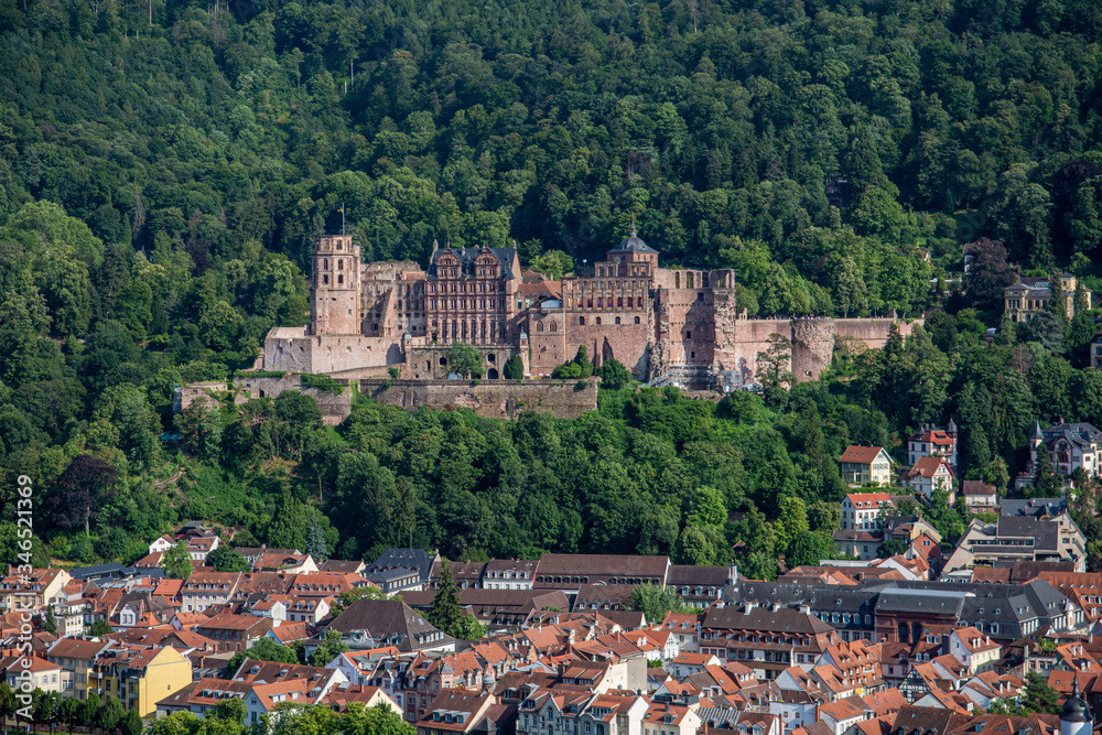 Heidelberg castle on hot summer day with old town