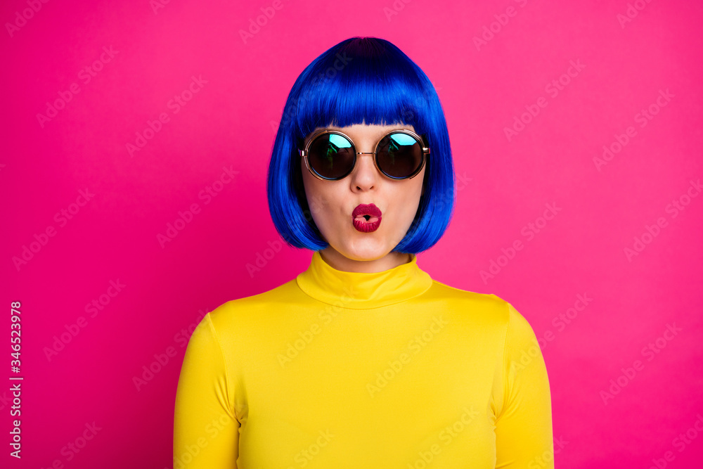 Closeup photo of cool trendy lady hold lips send kisses sexy chic wear stylish round retro specs yellow turtleneck blue short shiny wig isolated vibrant pink color background Closeup photo of cool trendy lady hold lips send kisses sexy chic wear stylish round retro specs yellow turtleneck blue short shiny wig isolated vibrant pink color background