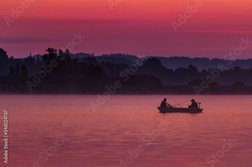 Fishermen during sunrise.