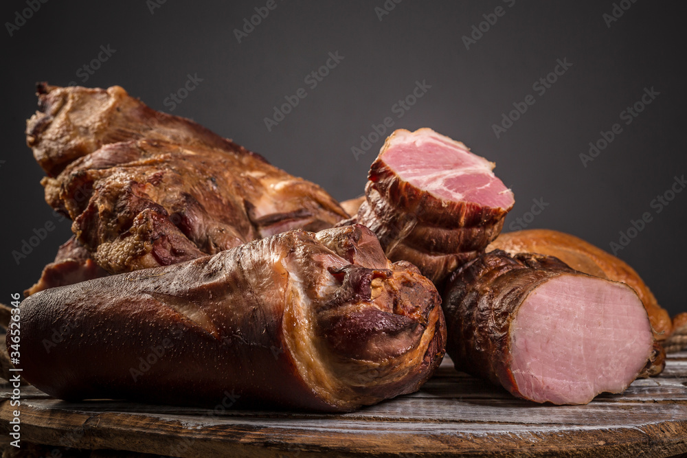 Obraz premium Smoked knuckle of pork meat natural product from organic farm. menu banner space for text