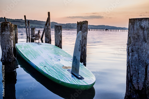 stand up paddle beautiful sunset over lake sempach lucerne photo