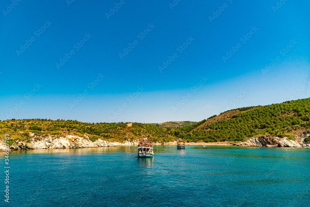 Ship moored in a natural bay