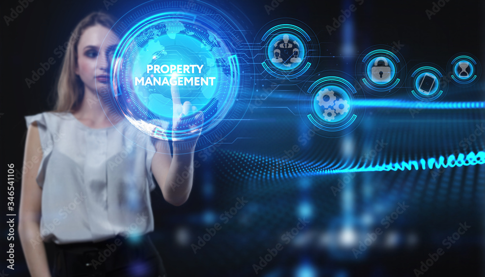 Business, Technology, Internet and network concept. Young businessman working on a virtual screen of the future and sees the inscription: Property management Business, Technology, Internet and network concept. Young businessman working on a virtual screen of the future and sees the inscription: Property management