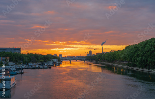 Gennevilliers, France - 05 06 2020: View of the Seine at sunrise from Clichy Bridge