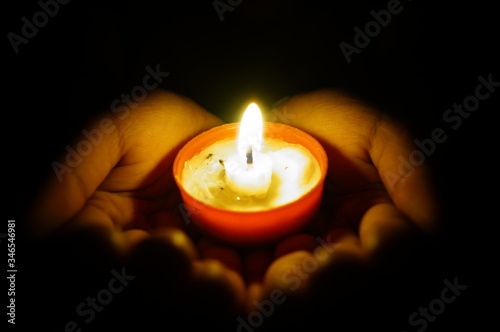 hand with candle so peacefull when pray