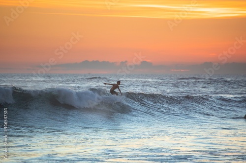 Sunset with surfing in Bali © Vadim