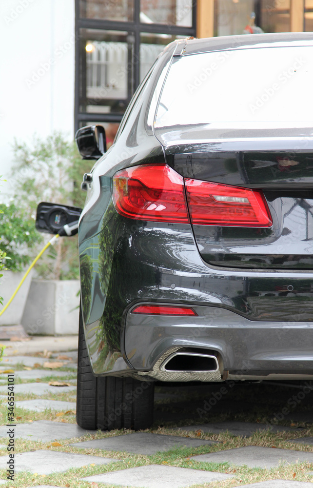 Fototapeta premium Back side of a black luxury car.