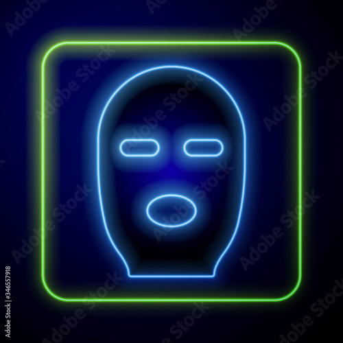 Glowing neon Thief mask icon isolated on blue background. Bandit mask, criminal man.  Vector Illustration