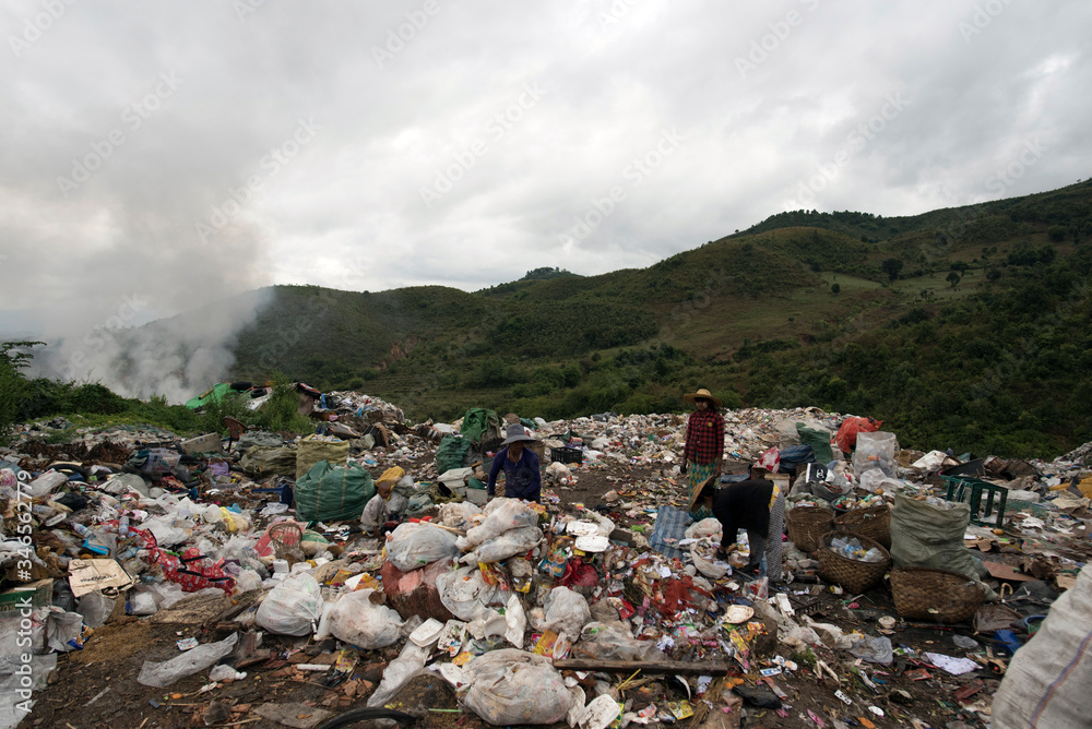 burning plastic trash and rubbish mountain in Myanmar 