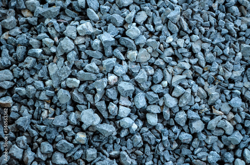 Blue granite gravel texture.Coarse aggregate for mix concrete in construction work.
