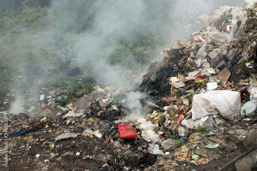 burning plastic trash and rubbish mountain in Myanmar 
