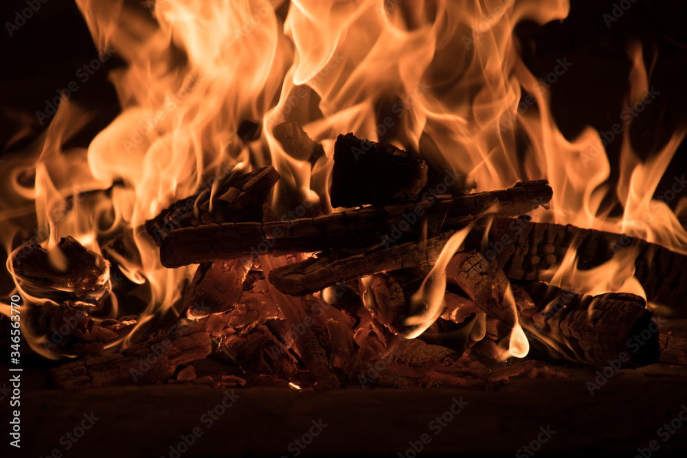 Fototapeta premium Fire and burn coals in stone oven. Oven made of brick and clay on the wood. Oven for pizza.