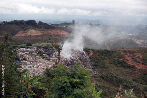 burning plastic trash and rubbish mountain in Myanmar 