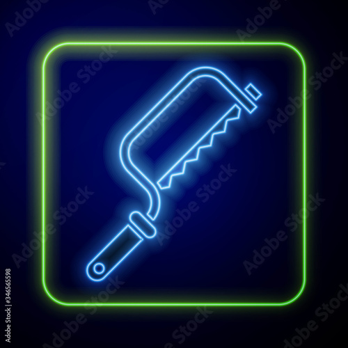 Glowing neon Hacksaw icon isolated on blue background. Metal saw for wood and metal.  Vector Illustration