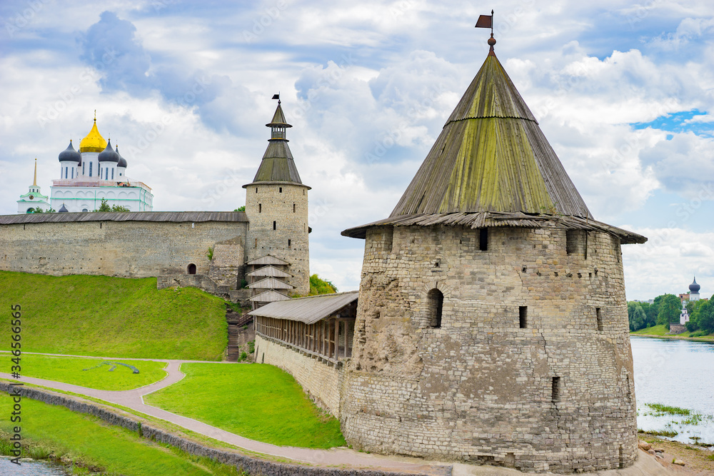 City Of Pskov. Russia. Ancient fortress on the background of the Church. Museum. Pskov fortress. Ancient fortress on the river Bank. Ancient cities of Russia. The Russian landscape.