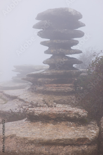 Landscape with fog in the Torcal de Antequera Natural Area. Antequera, Malaga province, in the autonomous community of Andalusia, Spain, Europe