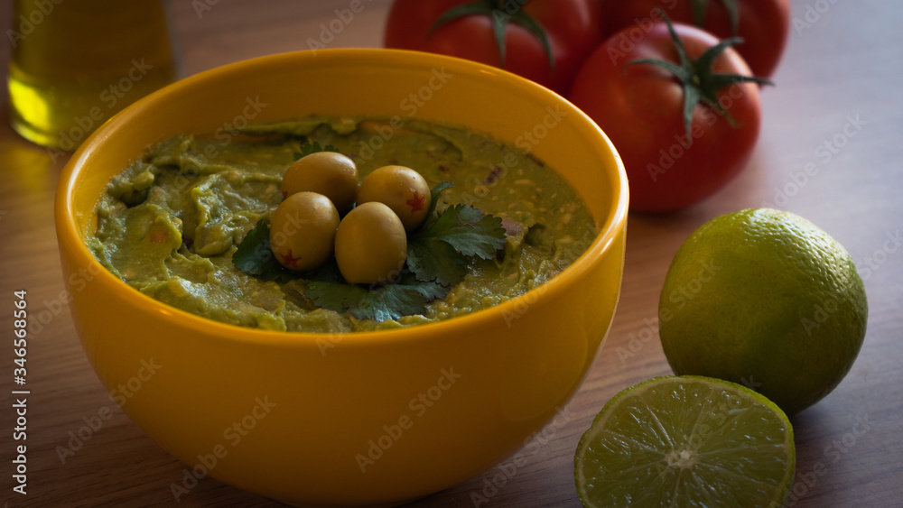 guacamole typical mexican food on wooden table
guacamole typical mexican food on wooden table