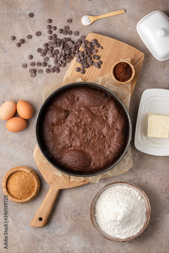 Ready brownie, chocolate cake in a detachable round shape. Top view, recipe, ingredients.