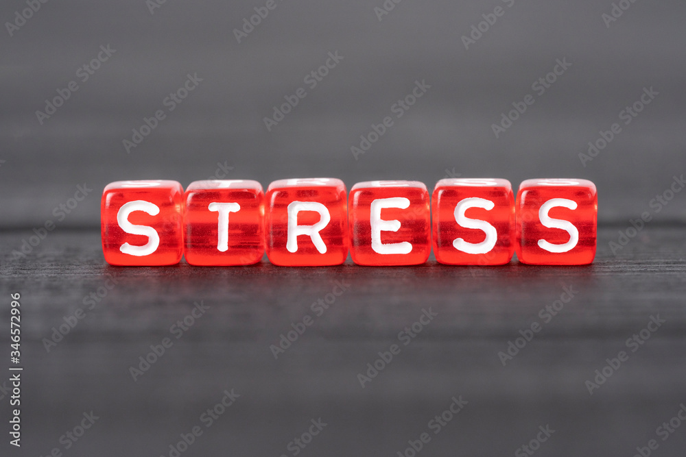 Stress word on red cubes. Depression problem concept Stress word on red cubes. Depression problem concept