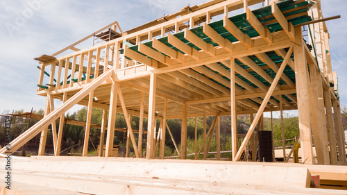 Framing of a new wooden house under construction
