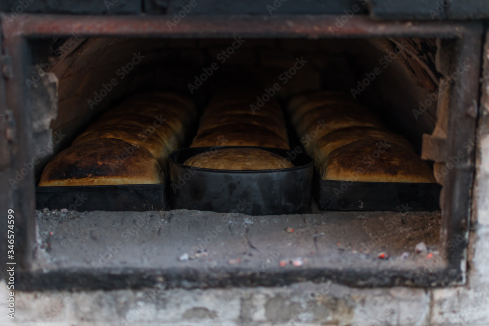 Fresh and crunchy home made bread, baked in traditional stone wood oven.