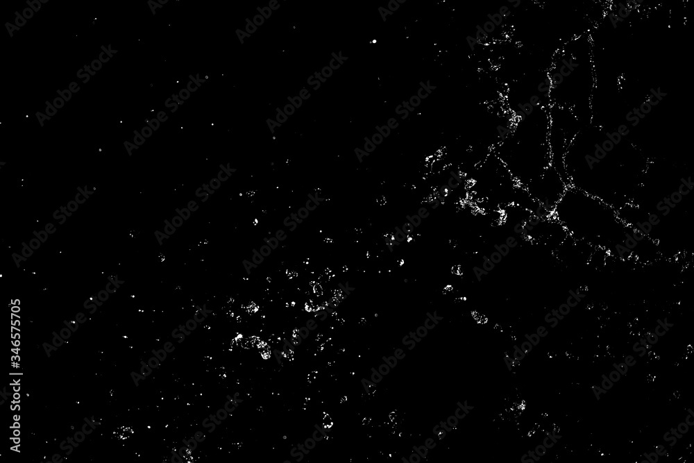 Splashes and drops of water are on a black background. Splashes and drops of water are on a black background.