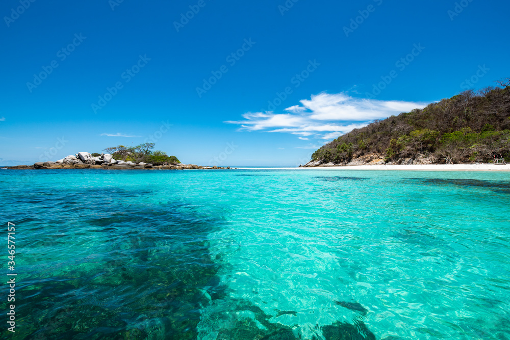 Racha Noi Island on a clear day with clear sea water during the high summer season,Phuket,Thailand.