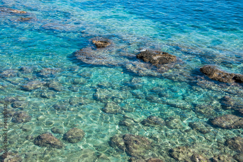 Beautiful stones in the clear water of the Mediterranean Sea