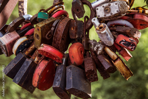 
colored metal locks on a green background