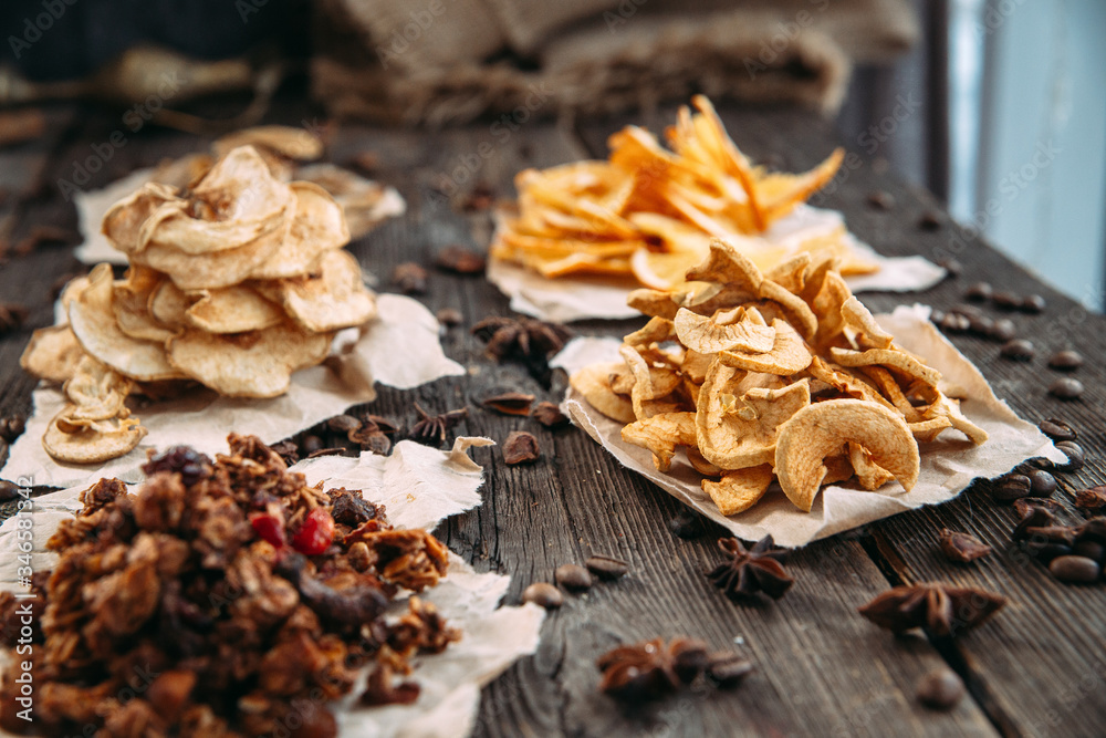 Dried slices of healhty food close up. Orange, apple, pear 