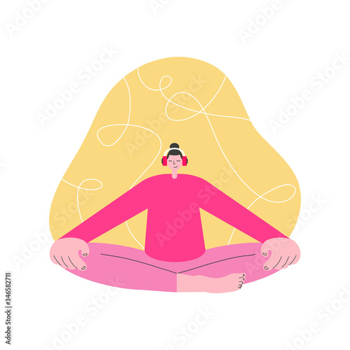 A female wearing pink t-shirt and pink trousers meditating with earphones using a mindfulness app and listening to a guided meditation in the online course.