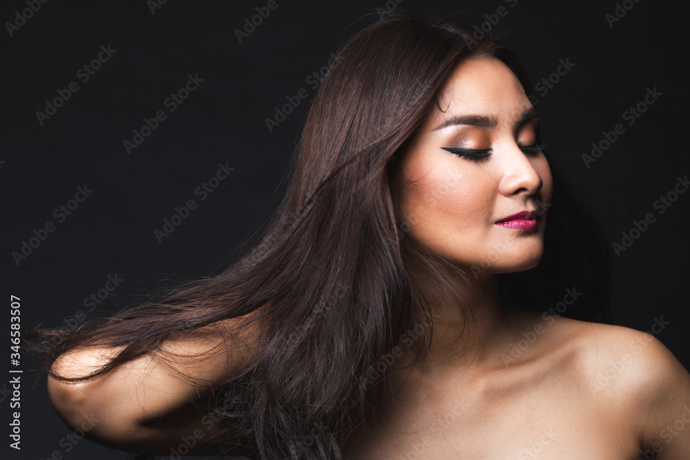 Fototapeta premium Portrait of young asian woman with makeup long hair.