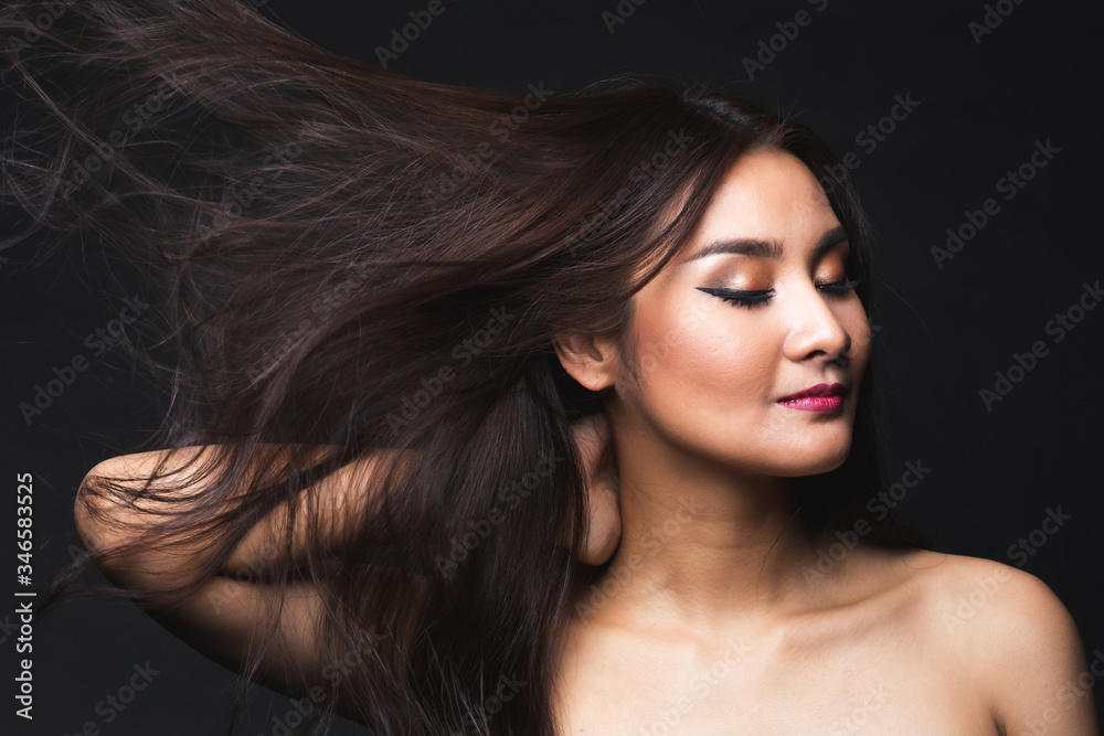 Portrait of young asian woman with makeup long hair. Portrait of young asian woman with makeup long hair.