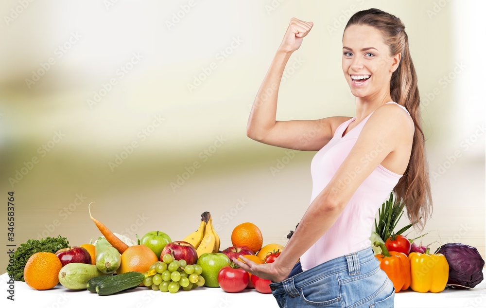 Young happy smile thin woman. Weight loss concept Young happy smile thin woman. Weight loss concept